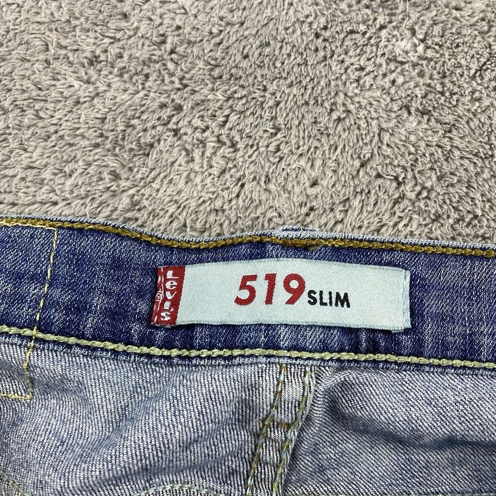 Levi's 519 Slim Jeans Mens 32X34‎ Blue Medium Wash Low Rise Distressed